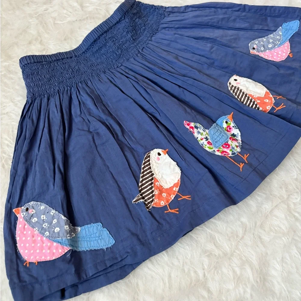 Mini Boden Beautiful Navy Skirt with Bird Appliqués - Picture 2 of 5